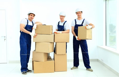 Staff and customers following safety procedures at a storage facility