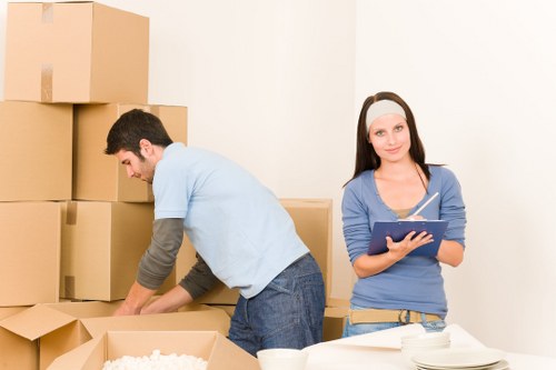 Business archive boxes and furniture arranged for cubic-yard pricing